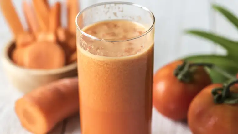 Fresh carrot juic macro shot
