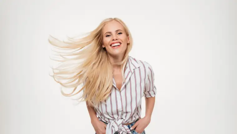 Portrait of a smiling cheerful woman in a shirt