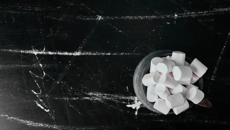 White marshmallows in a metallic cup