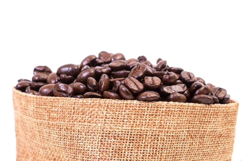 Sack of coffee beans on white background