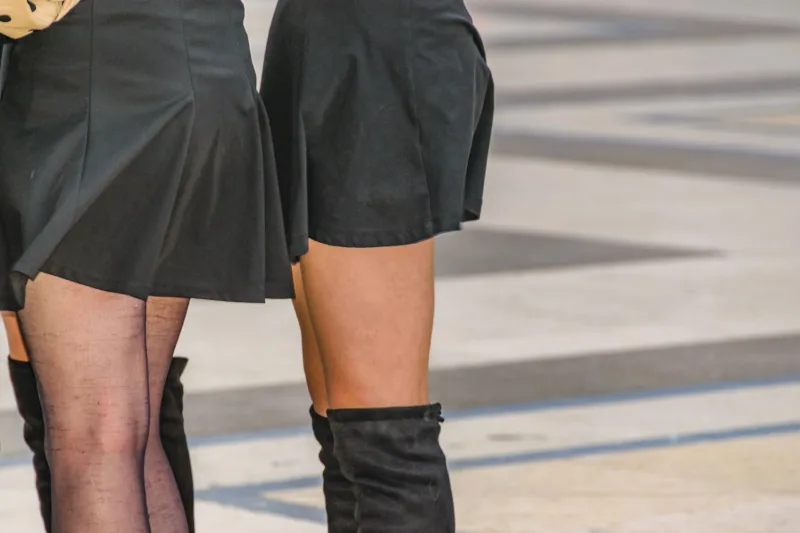 Women At Street Dressing Mini Skirts