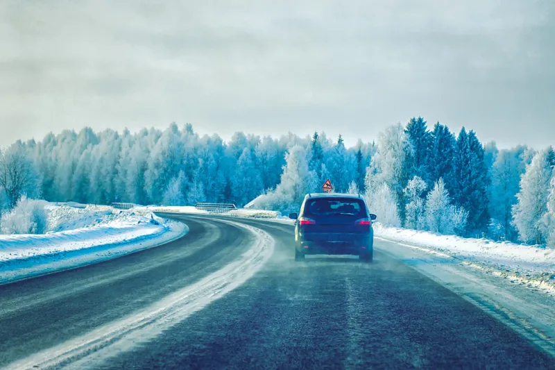 Car on road at winter Lapland Rovaniemi