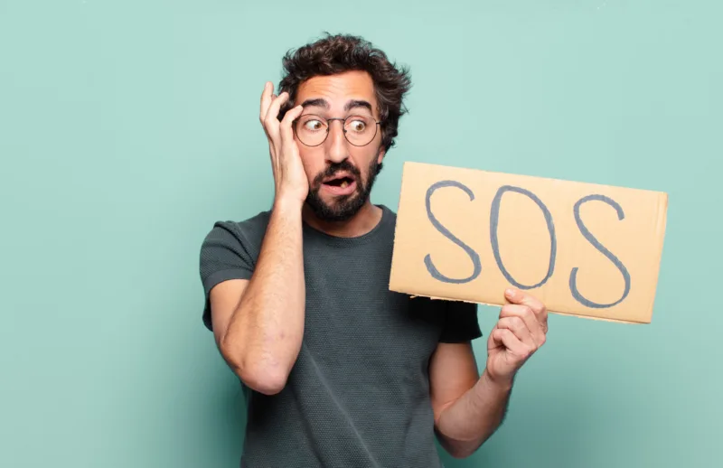young bearded man. sos or crisis concept