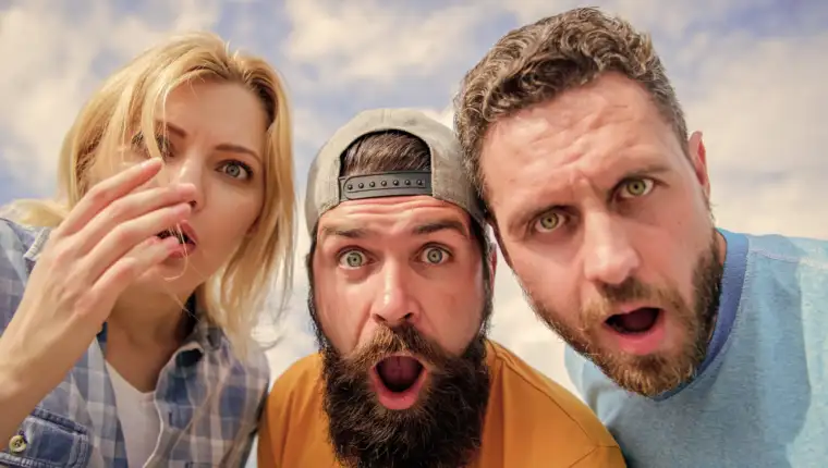 Friends shocked faces looking at you. That is impossible. Shocking news. Amazed surprised face expression. How to impress people. Shocking impression. Men with beard and woman looking shocked. No way