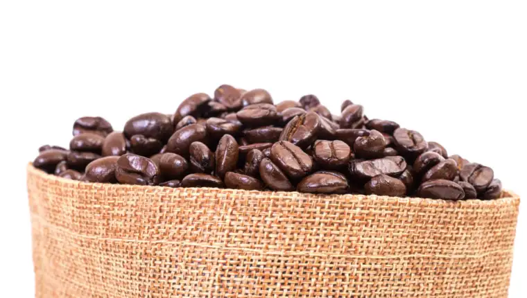 Sack of coffee beans on white background