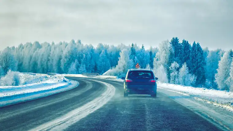 Car on road at winter Lapland Rovaniemi
