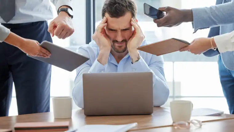 multitasking-stress-man-overwhelmed-office-with-headache-burnout-accountant-audit-financial-taxes-time-management-anxiety-frustrated-by-challenge-with-schedule-deadline (1)