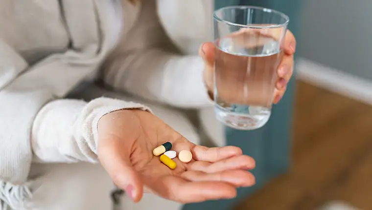 Woman,Takes,Medicines,With,Glass,Of,Water.,Daily,Norm,Of