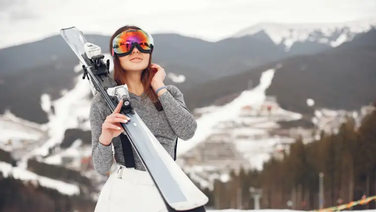 Woman skier in a winter day at a ski resort