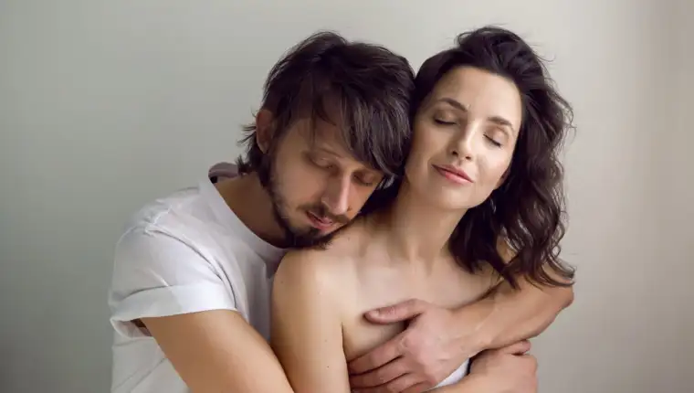 guy and a girl on a white background in the Studio
