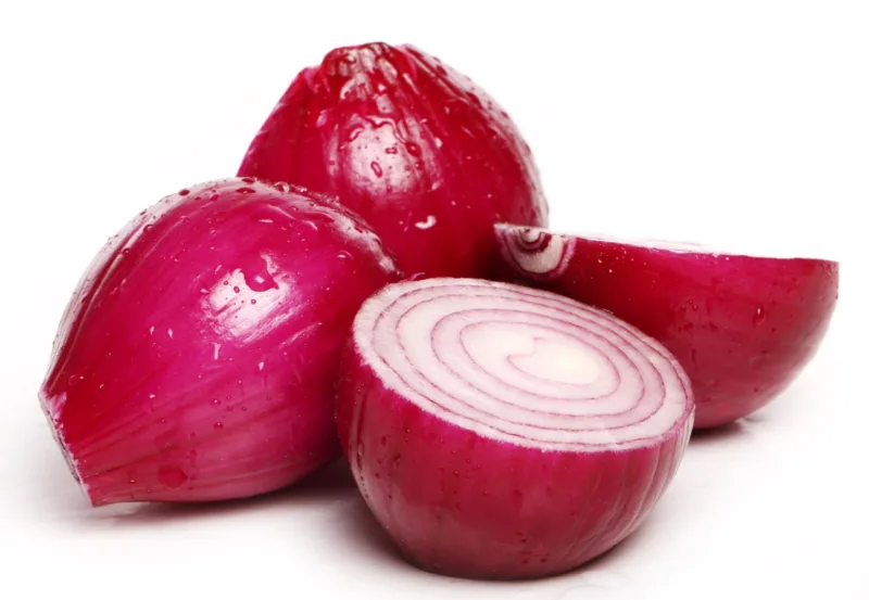 Red onion over white background