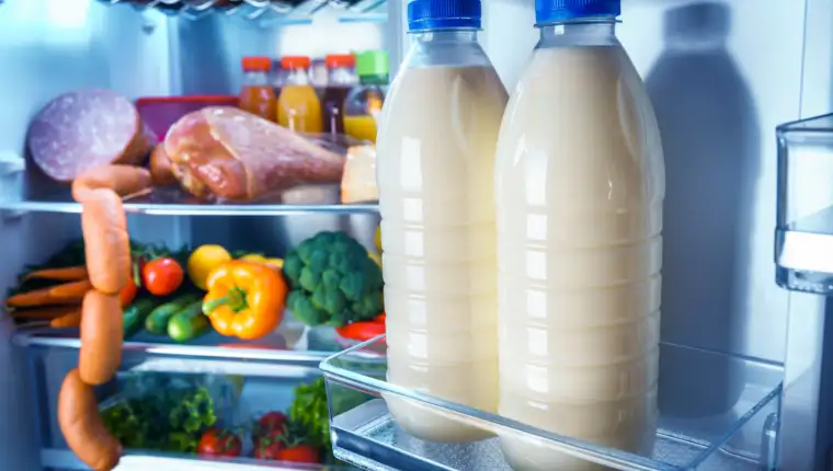 Open refrigerator filled with food