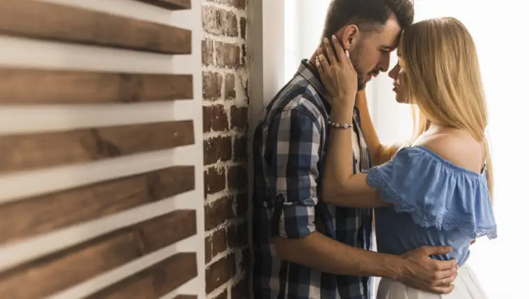 cute-couple-hugging-home