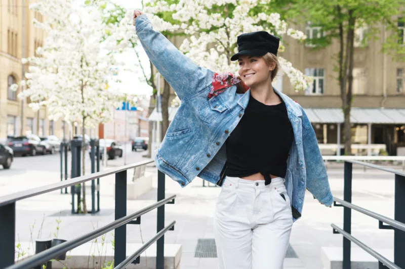 portrait-stylish-woman-wearing-jeans-jacket-black-cap