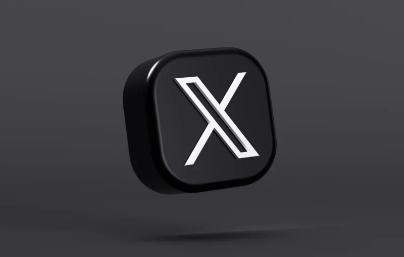 Valencia, Spain - July, 2023: X app floating logo on a dark color background in 3D rendering. X is the new name and logo of the social network Twitter owned by Elon Musk