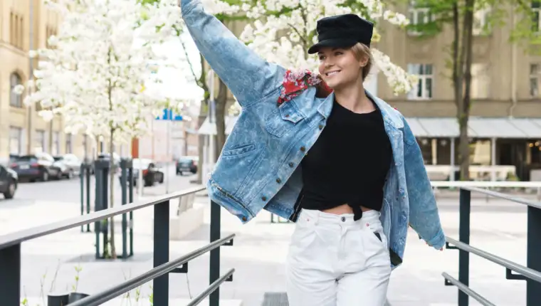 portrait-stylish-woman-wearing-jeans-jacket-black-cap
