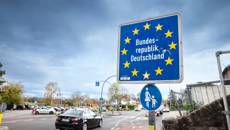 AACHEN, GERMANY - NOVEMBER 8, 2022: Standard EU border roadsign indicating the entrance to Germany (Bundesrepublik Deutschland), at the german border with Netherlands, in the Schengen area.