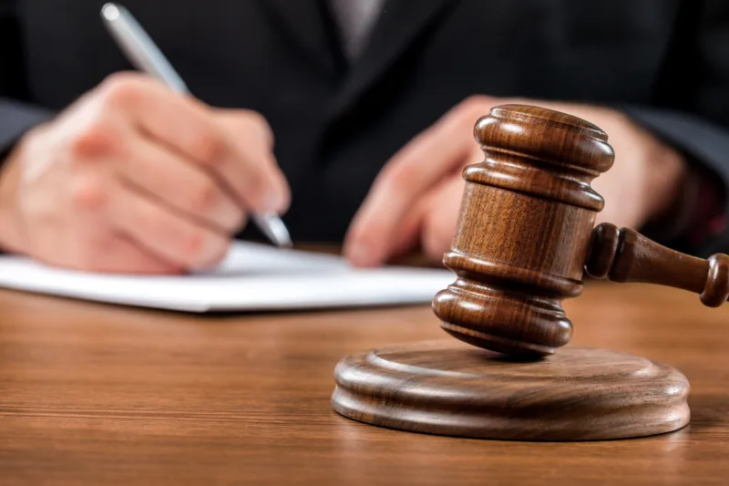 Close up gavel judge with lawyer working at courtroom.