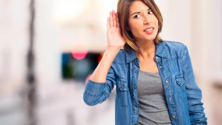 young cool woman trying to listen