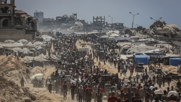 AA-20250722-38630867-38630865-HILJADE_IZGLADNJELIH_PALESTINACA_HRLE_U_PODRUCJE_ZAKIMA_TRAZECI_POMOC_U_GAZI