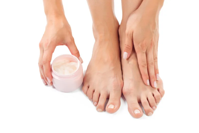 Beautiful female feet at spa salon