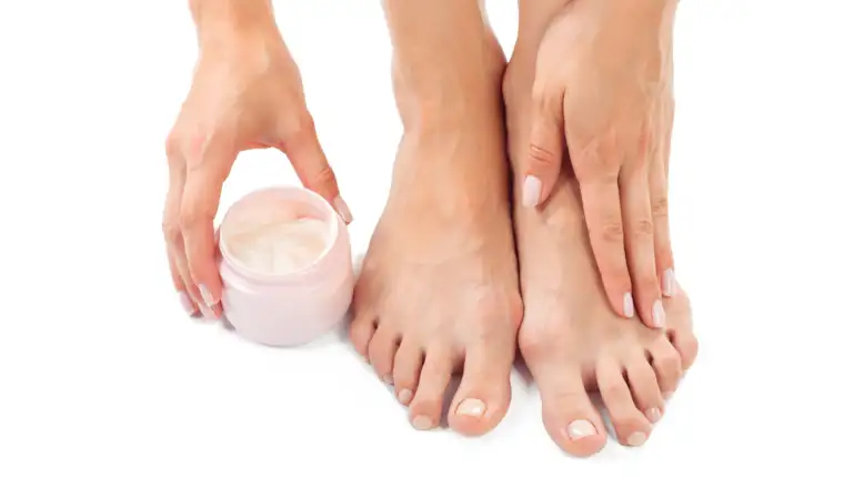 Beautiful female feet at spa salon