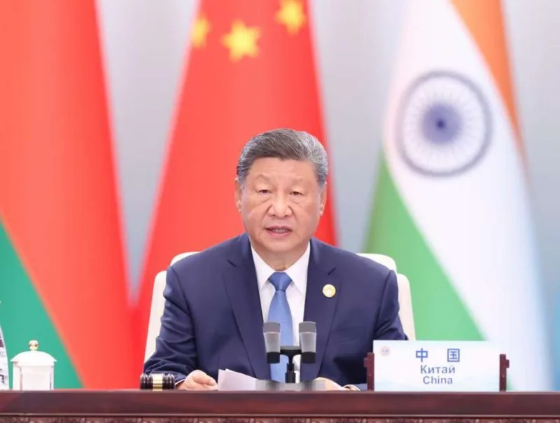 Xi