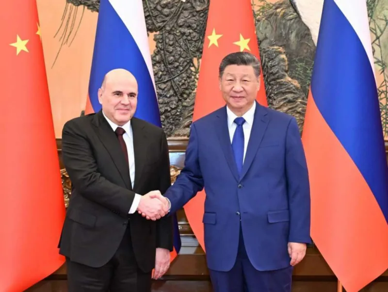 Xi