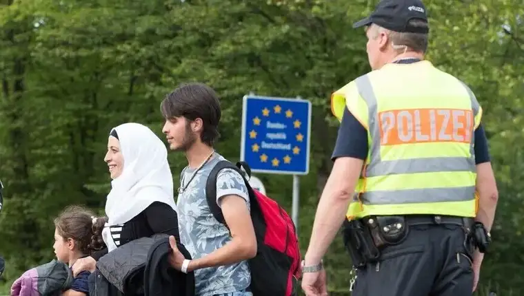 Migranti njemacka aa
