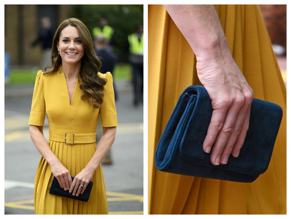 Kate Middleton u žutoj haljini drži u ruci plavu malenu torbicu duga smeđa kosa dan